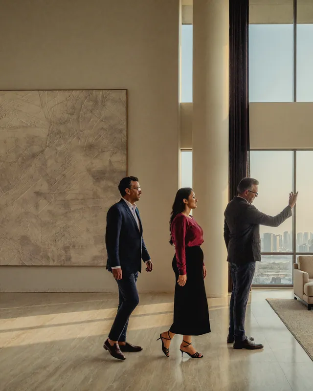 A couple being shown a finished apartment